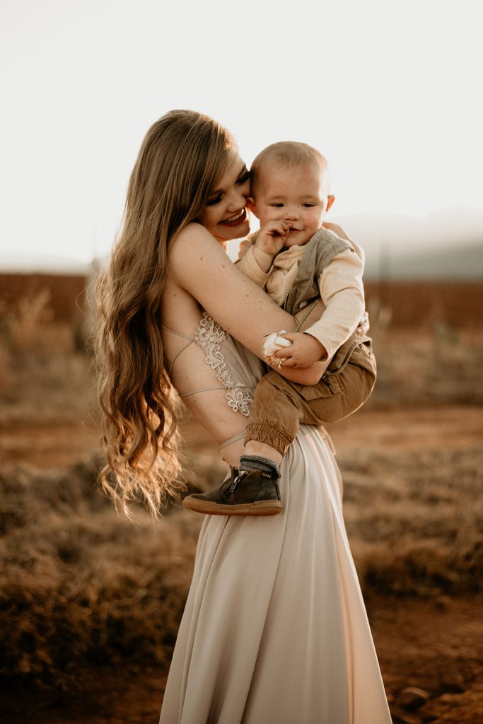 Mom hugging her boy at The Nut Farm Venue by Echo Photography